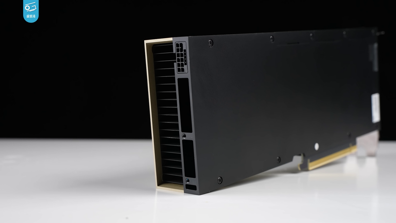 NVIDIA H100 PCIe accelerator with a black enclosure, gold edge, and rear power connector.