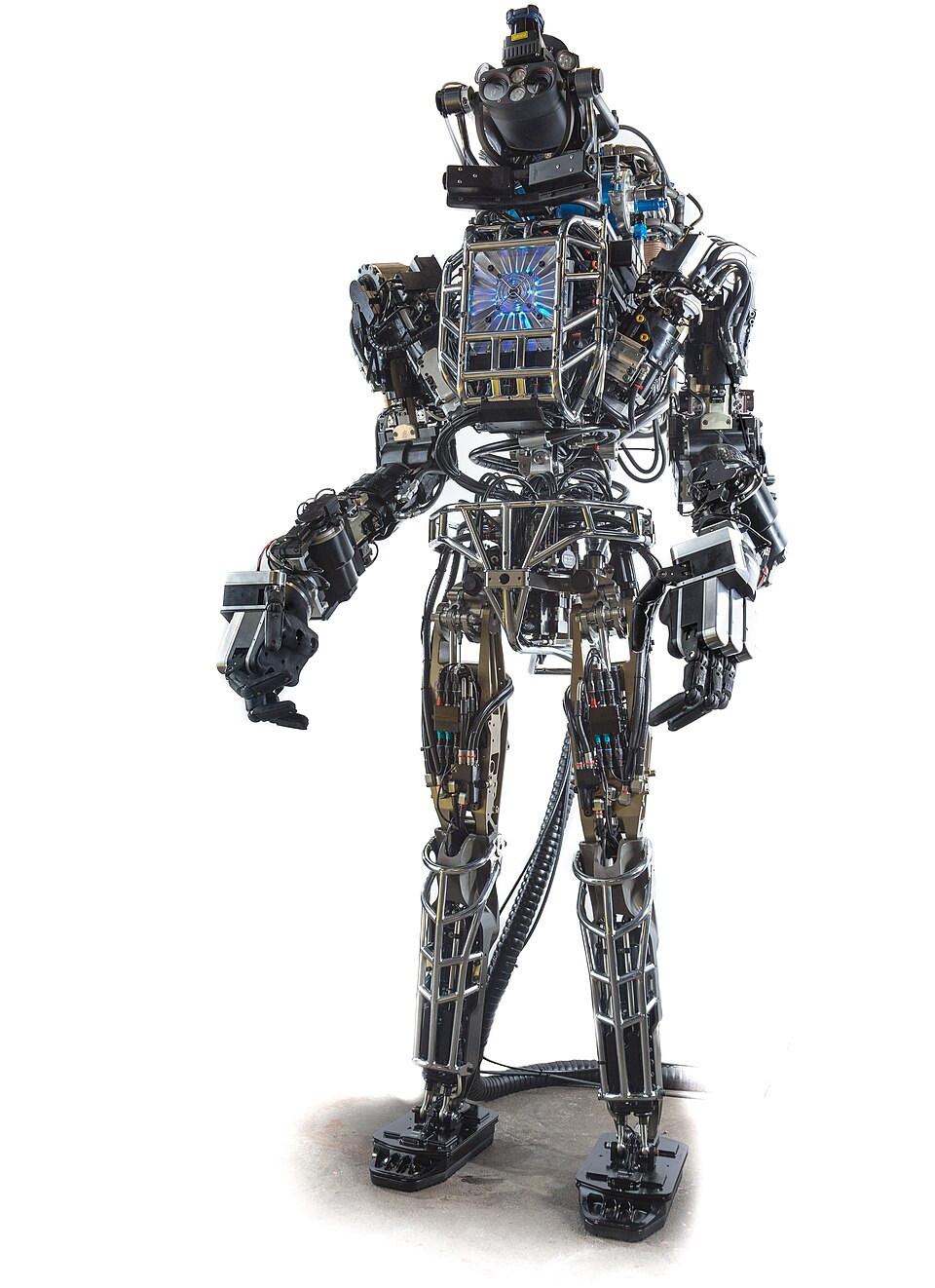 Front view of the original Atlas robot with exposed metal framework, hydraulic lines and sensor head